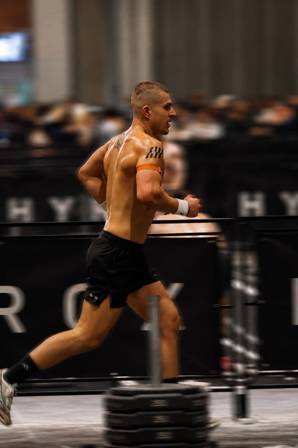 Jackson Harding running at a HYROX race